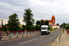 Mir, Karelicy raion, Hrodna Voblast, Belarus: Catholic church of St. Nicholas and truck on the road - photo by A.Dnieprowsky