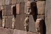 Tiwanaku / Tiahuanacu, Ingavi Province, La Paz Department, Bolivia: carved enemy heads along the walls of the Semi-Underground Temple - photo by C.Lovell