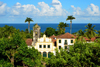 Olinda, Pernambuco, Brazil: the baroque Convent of St Francis / Church of Our Lady of the Snows, seen against the ocean and surrounded by vegetation - XVI century Portuguese colonial architecture, it is the oldest Franciscan convent in Brazil - Ladeira de So Francisco, Historic Centre of the Town of Olinda, UNESCO World Heritage Site - Convento de So Francisco /  Igreja de Nossa Senhora das Neves - photo by M.Torres