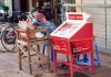 Cambodia / Cambodge - Phnom Penh: 'petrol station' attendant sleeps with Alain Delon (street 128) (photo by M.Torres)