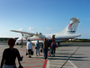 Canada / Kanada - St. John's, Newfoundland: at the airport - passengers board an Air St.Pierre Aerospatiale/Alenia ATR 42-320 F-OHLG cn323, the Albert Briand - photo by B.Cloutier