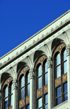 Winnipeg, Manitoba, Canada: terra-cotta cornice and windows with metal panels - Paris Building - Portage Avenue - Woodman and Carey architects - photo by M.Torres