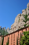 Montserrat, Catalonia: Buildings under the scarp at Santa Maria de Montserrat Benedictine abbey - photo by M.Torres