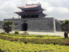 Dali, Yunnan Province, China: ornate tower on the city wall - photo by M.Samper