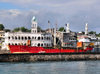 Moroni, Grande Comore / Ngazidja, Comoros islands: freighter and minarets of the old and new Friday mosques - photo by M.Torres