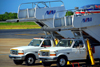 Punta Cana, Dominican Republic: AVIAM ground services passenger boarding stairs (air-stairs) on Ford F-380 trucks - cabins - Punta Cana International Airport - PUJ / MDPC - photo by M.Torres