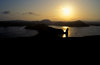 Bartolom Island, Galapagos Islands, Ecuador: the island and Pinnacle Rock at sunset - the island is named after naturalist Sir Bartholomew James Sulivan - photo by C.Lovell