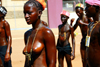 Bissau, Guinea Bissau / Guin Bissau: Amlcar Cabral Avenue, Carnival, young women parading / Avenida Amilcar Cabral, carnaval, jovens mulheres a desfilar - photo by R.V.Lopes