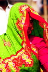 India: colorful clothes of an Indian woman - photo by Eric Petitalot