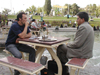 Iran - Isfahan / Esfahan / IFN (Esfahan province): smoking a water pipe - Naqsh-e Jahan Square - photo by Brenda Nassarian