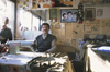 Iran: a tailor in his workshop - photo by W.Allgower