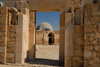 Amman - Jordan: gate of Umayyad mosque and dome of the Umayyad palace - citadel - photo by M.Torres