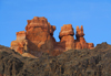 Kazakhstan, Charyn Canyon: Valley of the Castles - 'castle' with four towers - harder volcanic rocks at the bottom and softer sedimentary rocks at the top - photo by M.Torres