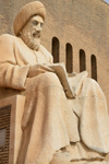 Erbil / Hewler / Arbil / Irbil, Kurdistan, Iraq: statue of the historian Ibn Al-Mustawfi aka Mubarak Ben Ahmed Sharaf-Aldin reading a book - entrance to Arbil Citadel - minister of Erbil in the era of Sultan Muzafardin - Qelay Hewlr - UNESCO world heritage site - photo by M.Torres