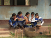 Laos - Muang Noi / Nong Khiaw: girls in front of their school - photo by P.Artus