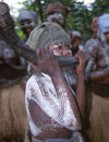 Grand Bassa County: secret society girls - musician playing a horn (photo by M.Sturges)