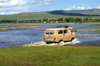 Khorgo-Terkhiin Tsagaan Nuur NP, Arkhangai Province, Mongolia: UAZ-452 driving through a river, on the way to the White Lake - photo by A.Ferrari