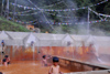 Nepal - Langtang region - children bathe in hot springs - spa - photo by E.Petitalot