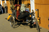 Kathmandu, Nepal: pedicab - a cycle rickshaw driver taking a nap - Durbar Square - photo by W.Allgwer