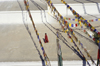 Kathmandu valley, Nepal: Bodhnath temple complex - Buddhist novice and prayer flags - photo by W.Allgwer