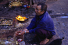 Kathmandu valley, Nepal: Swayambhunath temple complex - man during a puja ritual - photo by W.Allgwer