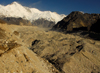 Khumbu region, Solukhumbu district, Sagarmatha zone, Nepal: sediment on a glacier bed under Cho Oyu mountain - 8,201 m - the sixth highest mountain in the world - view from Gokyo - photo by E.Petitalot