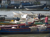 Panama City: small boats - fishermen prepare their crafts for the daily chores - photo by H.Olarte