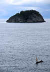 Santana, Cantagalo district, So Tom and Prcipe / STP: small fishing boat and Santana islet - view from Santana Club Resort / barco de pesca e Ilhu Santana, visto do miradouro do Resort Club Santana - photo by M.Torres