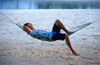 Singapore: sleeping in a hammock - Sentosa Island (photo by S.Lovegrove / Picture Tasmania)