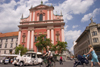 Franciscan church of the Annunciation and Presernov trg - people and tourist train, Ljubljana, Slovenia - photo by I.Middleton