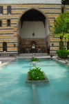 Damascus, Syria: Azem Palace - pond and arch - Museum of Arts and Popular Traditions - awarded the Aga Khan Award for Architecture in 1983 - former residence of the Ottoman governor - photographer: M.Torres