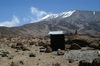 63 Tanzania - Kilimanjaro NP: Marangu Route - day 4 - Mount Kilimanjaro, toilet stop with a view on Kibo - photo by A.Ferrari