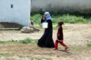 Turkey - Harran: woman and girl - photo by C. le Mire