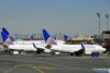 Newark, New Jersey, USA: Continental aircraft with Manhatan skyline in the background - Terminal C - Newark Liberty International Airport - Boeing 737-724(WL) cn 28950, N14735 - photo by M.Torres