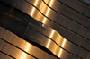 Denver, Colorado, USA: Colorado Convention Center - undulating metal panels of the faade in the golden sunlight - photo by M.Torres