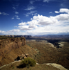 Canyonlands National Park, Utah, USA: cliff with layers exposing the local geology - clouds above a canyon - photo by J.Fekete