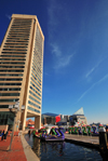 Baltimore, Maryland, USA: Baltimore World Trade Center, National Aquarium and dragon paddle boats - Inner Harbor - photo by M.Torres