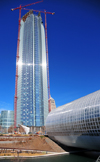 Oklahoma City, OK, USA: Devon Tower and Crystal Bridge Tropical Conservatory over the pond of Myriad Botanical Gardens - photo by M.Torres