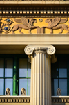 Wilmington, DE, USA: Wilmington Public Library, one of the nation's oldest public libraries - architect Henry Hornbostel, Classical Revival style -  capital of an Ionic order column and frieze with winged lions and blue roses - photo by M.Torres