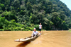 Ba Be National Park - vietnam: locals people using a thin long boat for fishing and transportation. - photo by Tran Thai