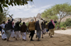 Wadi Dhahr, Al-Mahwit Governorate, Yemen: men with drawn jambiyas performing wedding dance outside Dar al-Hajar palace - women have a separate celebration - photo by J.Pemberton